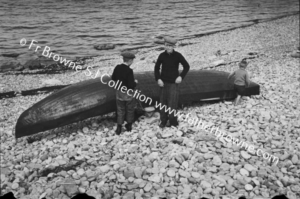 TWO BOYS WITH CURRACH